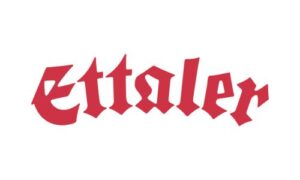 Ettaler Klosterbier in ansprechender roter Schrift, ein traditionelles bayerisches Bier aus dem Kloster Ettal, ideal für Bierliebhaber.