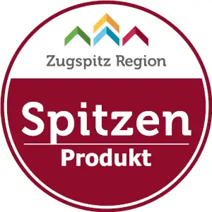 Das Logo der Zugspitz Region zeigt "Spitzenprodukt" und steht für hochwertige, regionale Angebote und Dienstleistungen.